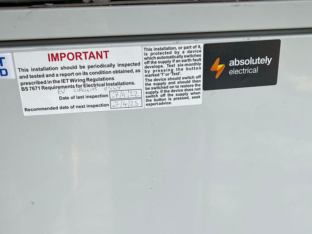 Inspection label on a distribution board