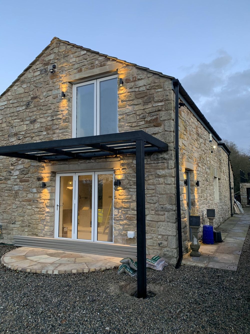 Stone barn conversion with exterior lighting